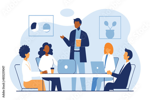 A presenter leads a discussion with colleagues around a conference table