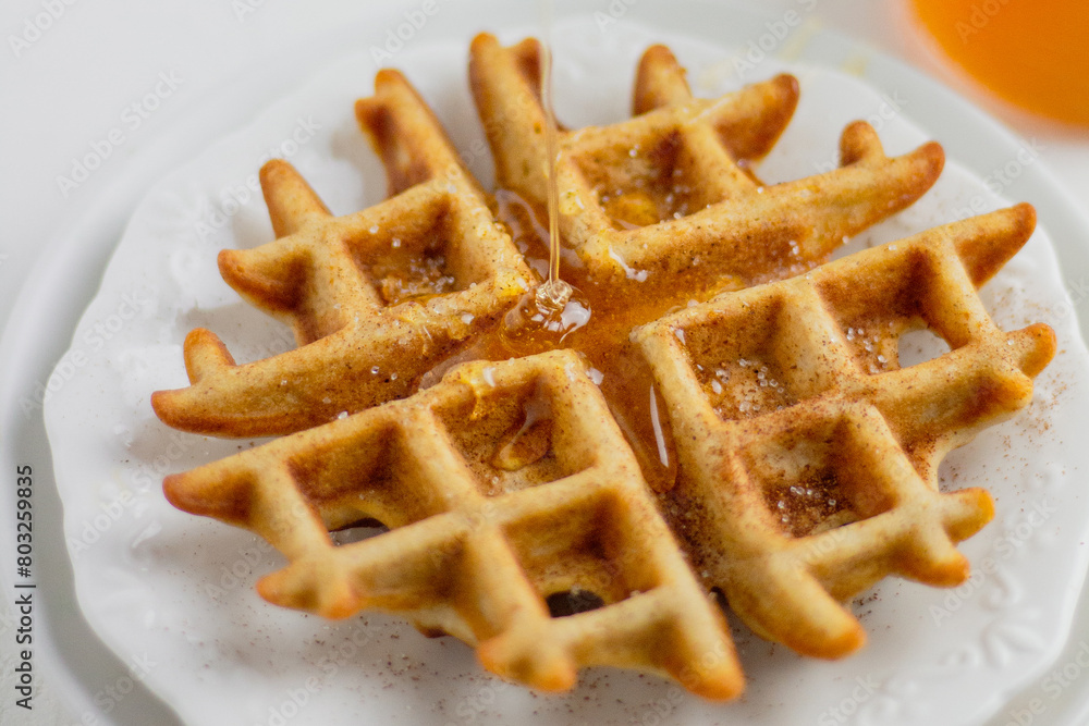 Waffle with honey. Aesthetic composition. Food Styling. Waffle with honey. Aesthetic composition. Food Styling.