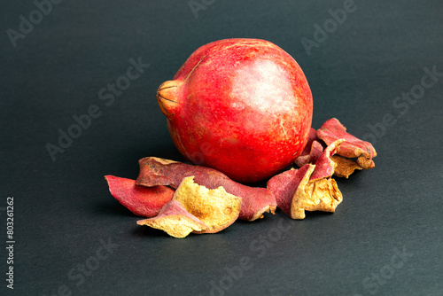 dry pomegranate skin and fresh fruit. Dry pomegranate (Punica granatum) peel.