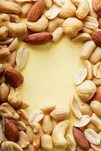 background close up of peanuts, nuts and almonds