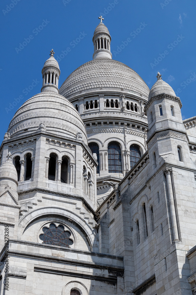 The Sacré-Cœur is a basilica on top of Montmartre hill (Paris, France). The temple, dedicated to the Sacred Heart of Jesus. The Sacré-Cœur is a basilica on top of Montmartre hill (Paris, France). The temple, dedicated to the Sacred Heart of Jesus.