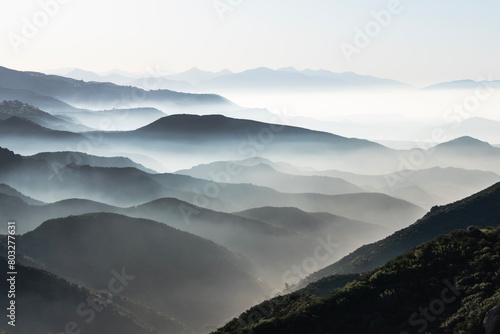 Foggy canyon ridges near Porter Ranch and Chatsworth in Los Angeles, California.  © trekandphoto
