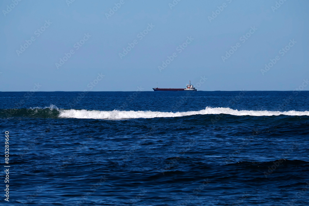 ship in the sea from Aveiro portugal sand dunes Atlantic Ocean beach view landscape panorama ship in the sea from Aveiro portugal sand dunes Atlantic Ocean beach view landscape panorama