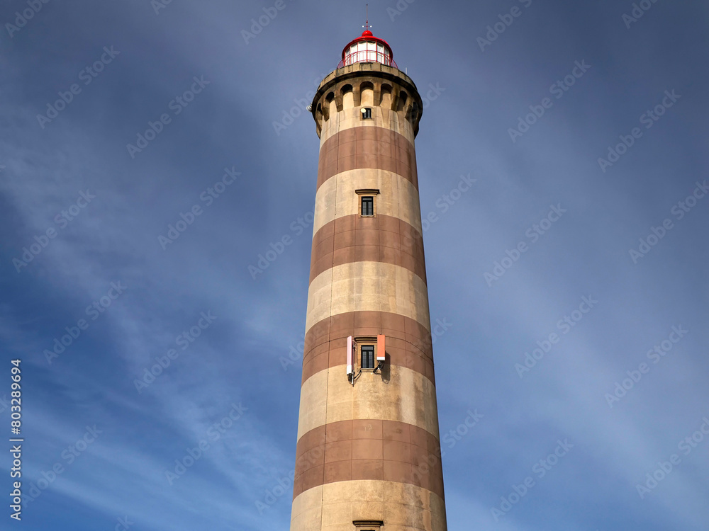 Farol de Aveiro. Lighthouse in the coast of Aveiro, in front of atlantic ocean, biggest of Portugal