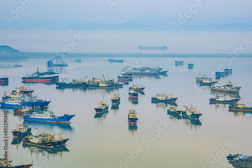 Xiaoruo Village, Wenling City, Taizhou City, Zhejiang Province - fishing village and fishing port at sunrise photo