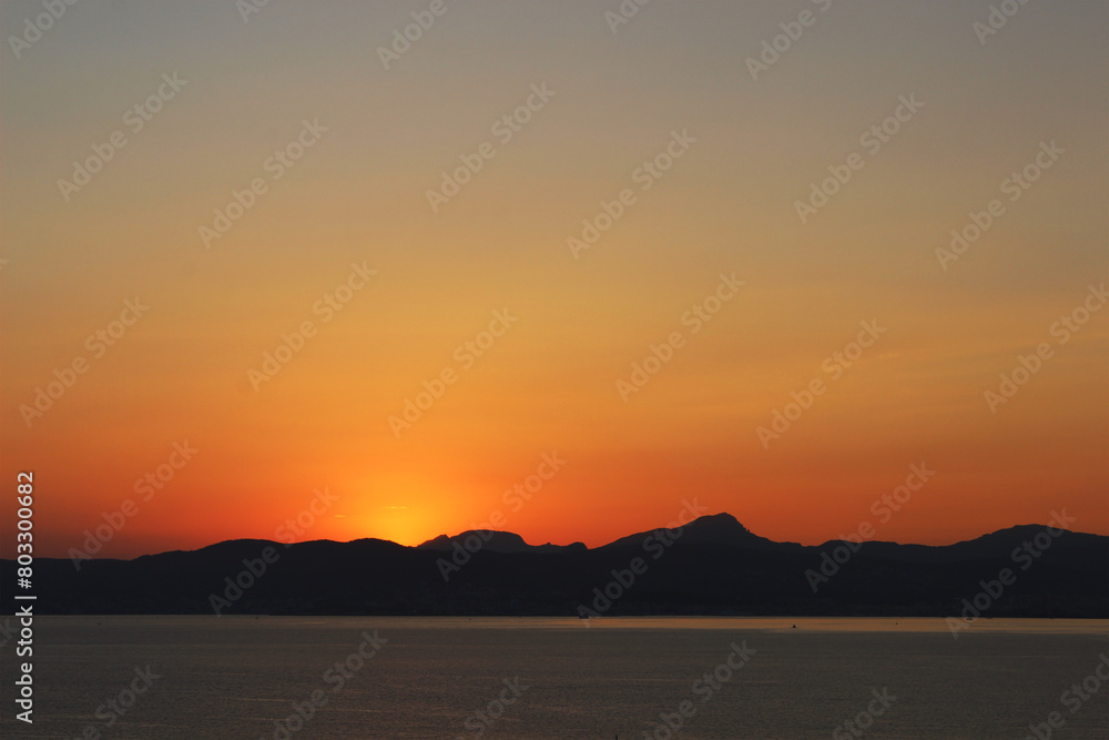Scenic sunset over the island of Majorca (Mallorca), Spain.	