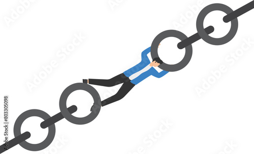 businessman trying to hold broken chain together, link chain together concept

