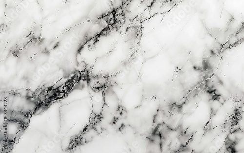 Elegant white marble texture with subtle veins and natural patterns. photo