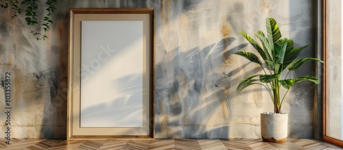 Frame without a picture and ornamental plant. photo