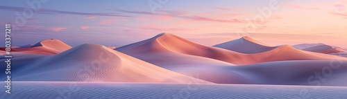 Abstract flowing dunes with a radiant evening sky backdrop photo