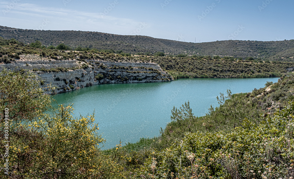 View of Symvoulos Dam and the water Reservoir, as seen from the circular walk around the lake, located near Satira village, west of Limassol, Cyprus View of Symvoulos Dam and the water Reservoir, as seen from the circular walk around the lake, located near Satira village, west of Limassol, Cyprus