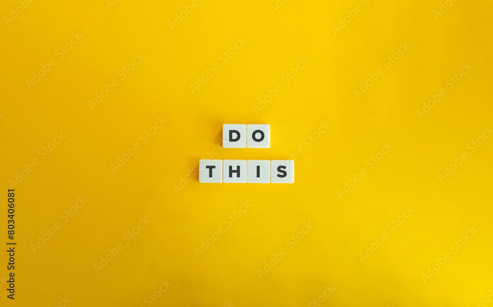 Do This Banner. Text on Block Letter Tiles on Yellow Background. Minimal Aesthetics. Do This Banner. Text on Block Letter Tiles on Yellow Background. Minimal Aesthetics.