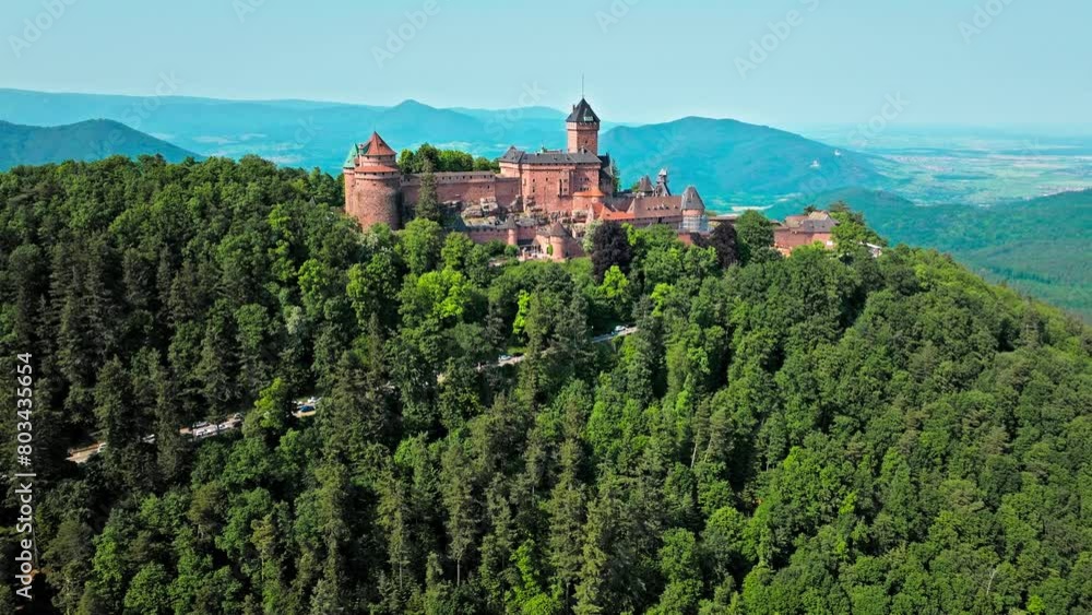 Aerial view of restored mountain fortress with an artillery platform, medieval garden and royal rooms. Medieval castle Château du Haut-Kœnigsbourg in Orschwiller, France.
Aerial view of restored mountain fortress with an artillery platform, medieval garden and royal rooms. Medieval castle Château du Haut-Kœnigsbourg in Orschwiller, France.