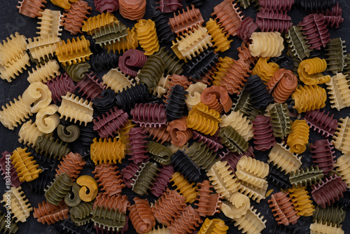 Background from colorful italian dry pasta