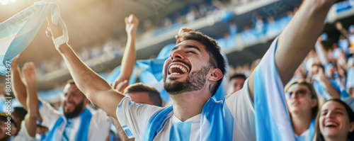 Argentine football soccer fans in a stadium supporting the national team, Albiceleste, Gauchos
 photo
