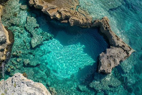A tranquil image of Heart Island's heart-shaped lagoon, with its crystal-clear waters inviting a refreshing swim. © Faisu