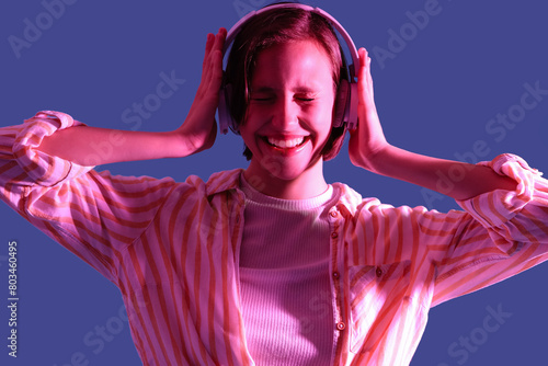 Happy young woman enjoying ...