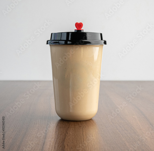 A glass of sapodilla milk shake photo