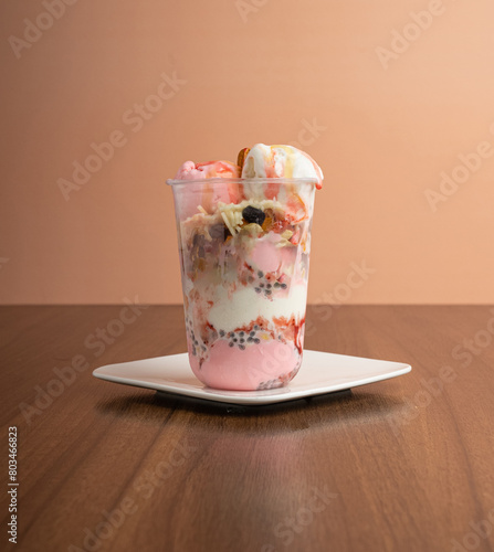Vanilla and Strawberry ice cream with dry fruits, vermicelli, poppy seeds and Milk