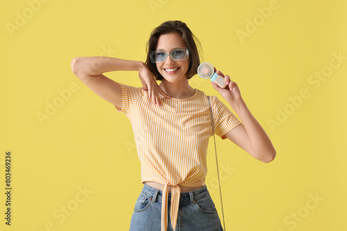 Young woman with portable e...