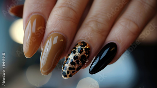 Wild Elegance: A Stylish Manicure Design Featuring Brown Tones and Leopard Pattern