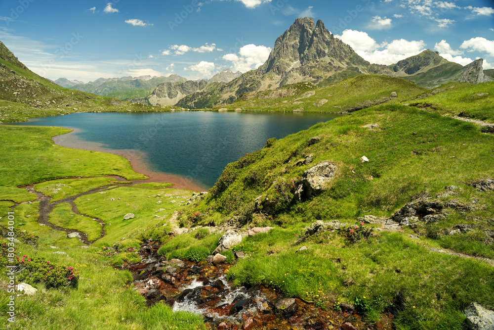 Beautiful mountain stream and lake in Pyrenees (Lacs d' Ayous), popular hiking route, France