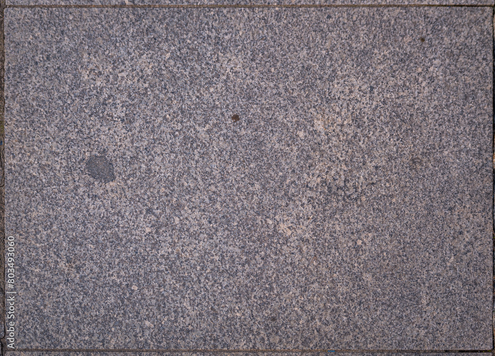 Fototapeta premium granite from a pedestrian street in Toruń