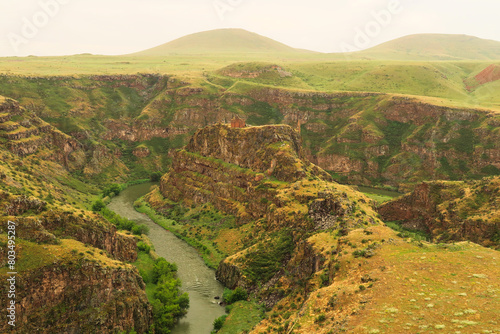 Beautiful view on the promontory with the ruins of the Church of Saint Elia, Zakares Church on top, last remaining building of the Kizkale, Maidens, Virgins Castle, ancient site of Ani, Kars, Turkey photo