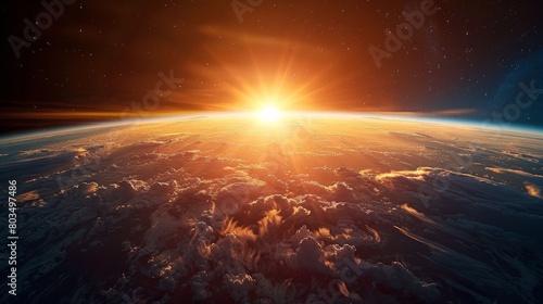 A brilliant and dynamic image conveying the power and splendor of the sun's setting rays over Earth