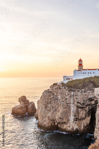 Farol do Cabo de Sao Vincente in Sagres in the Algarve Portugal. Overlooking the blue sea during a beautiful golden sunset