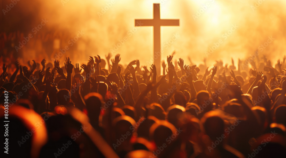 Large crowd of people praying to god and Jesus in front of the Cross