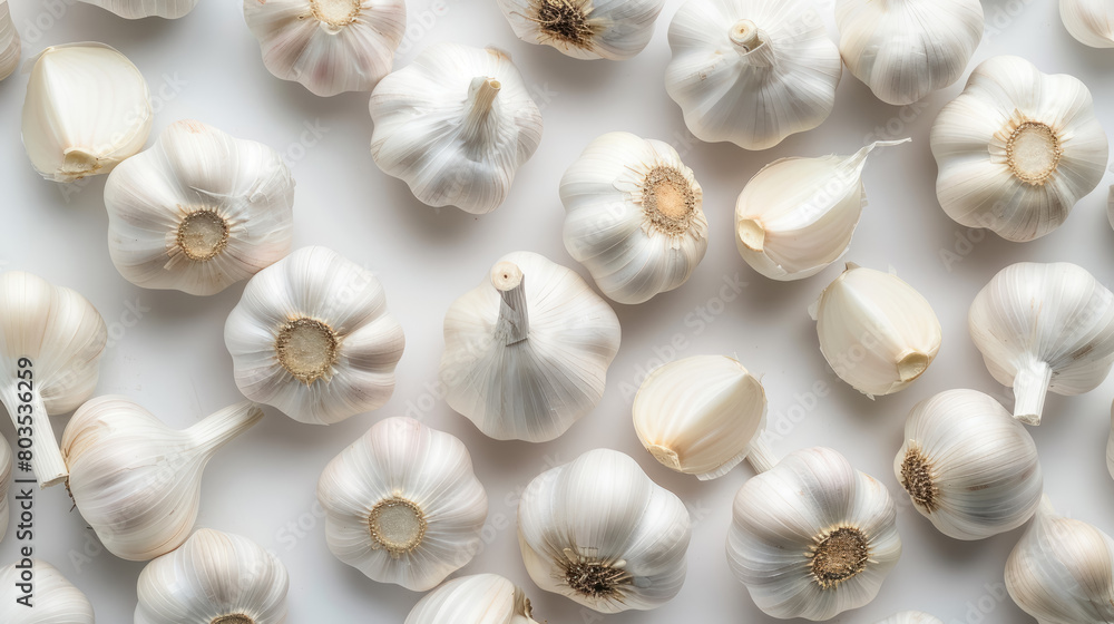 fresh whole garlic bulbs arranged neatly on a white background fresh whole garlic bulbs arranged neatly on a white background