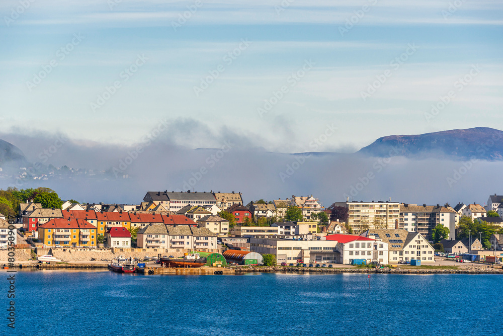 view of the city of Alesund shrouded in fog, Norway