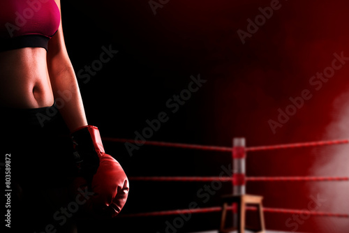 Portrait of a boxing woman with red boxing gloves © Leo Lintang