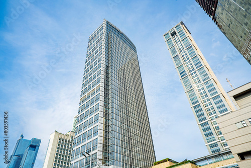 Skyscrapers and office building with blue sky