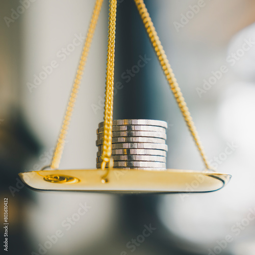 Coins stack with balance scale. Money management, financial plan, time value of money, business idea and Creative ideas for saving money concept. 