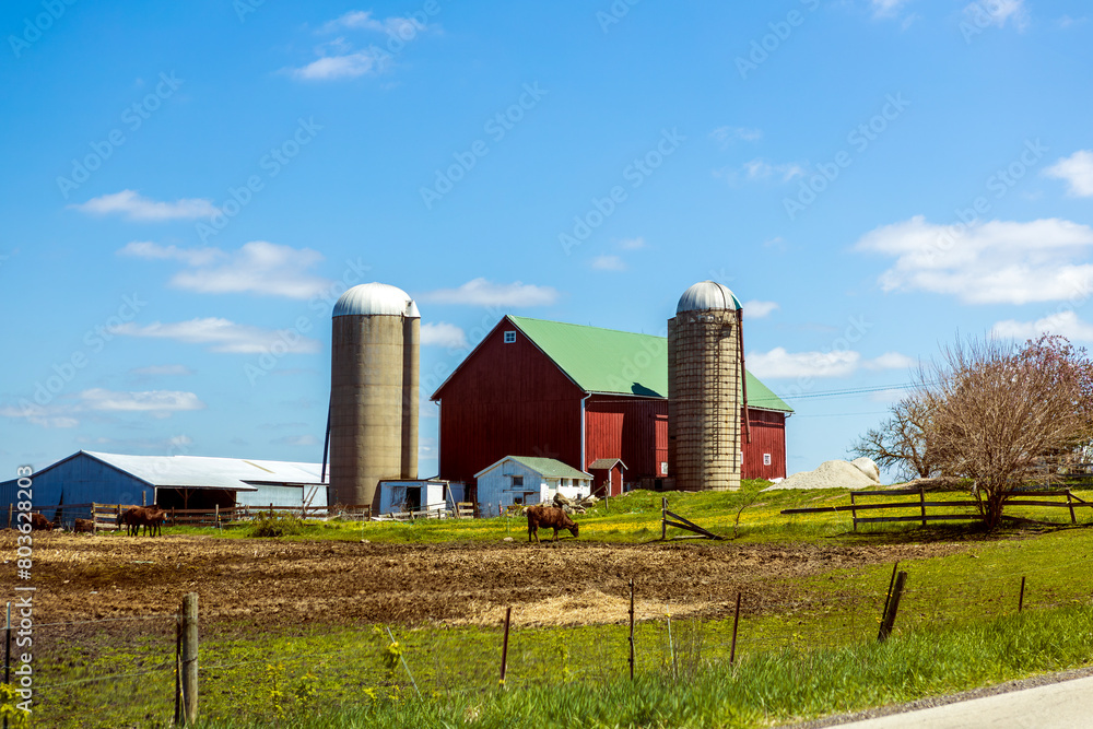 Red farm with country road