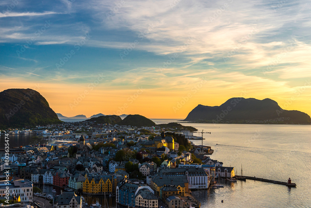  top view of a sunset over The city of Alesund and the sea during a sunny evening, Norway