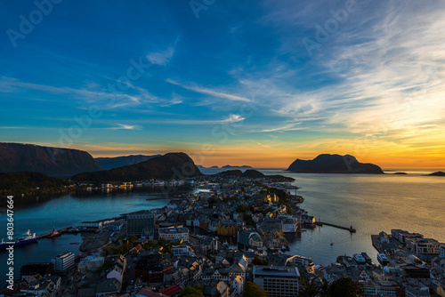  top view of a sunset over The city of Alesund and the sea during a sunny evening, Norway photo