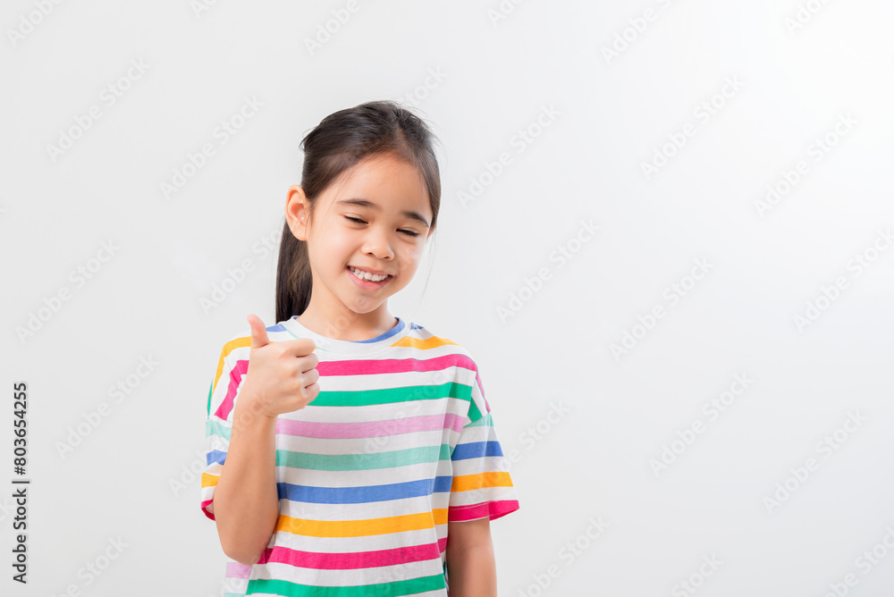 Cheerful Asian girl Posing cutely on a white background Cheerful Asian girl Posing cutely on a white background