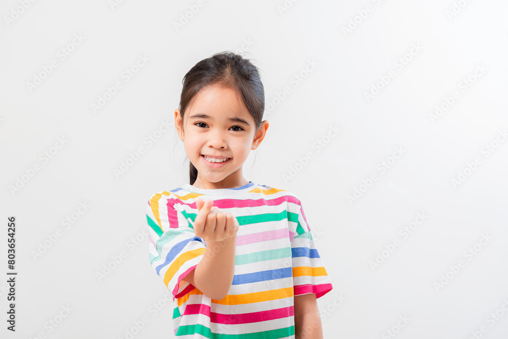 Cheerful Asian girl Posing cutely on a white background Cheerful Asian girl Posing cutely on a white background