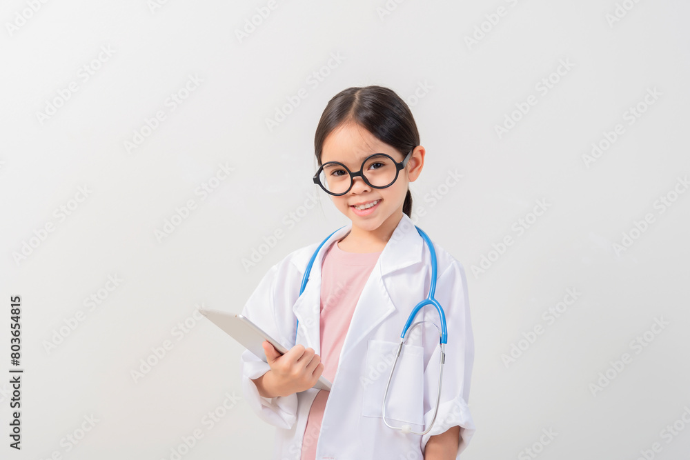 Cute little girl asian with stethoscope playing doctor Cute little girl asian with stethoscope playing doctor