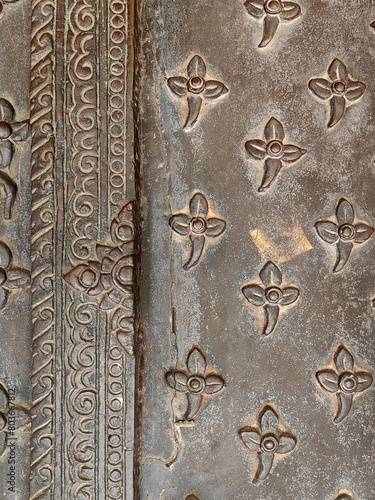 Detail close up of a thai sculpture pattern made of metallic iron © PICKRICK