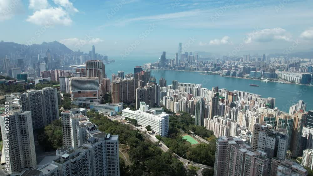 Aerial drone skyview of Hong Kong West Kowloon Victoria Harbour Financial Tsim Sha Tsui Hung Hom Central Admiralty Wan Chai Happy Valley Causeway Bay Aerial drone skyview of Hong Kong West Kowloon Victoria Harbour Financial Tsim Sha Tsui Hung Hom Central Admiralty Wan Chai Happy Valley Causeway Bay
