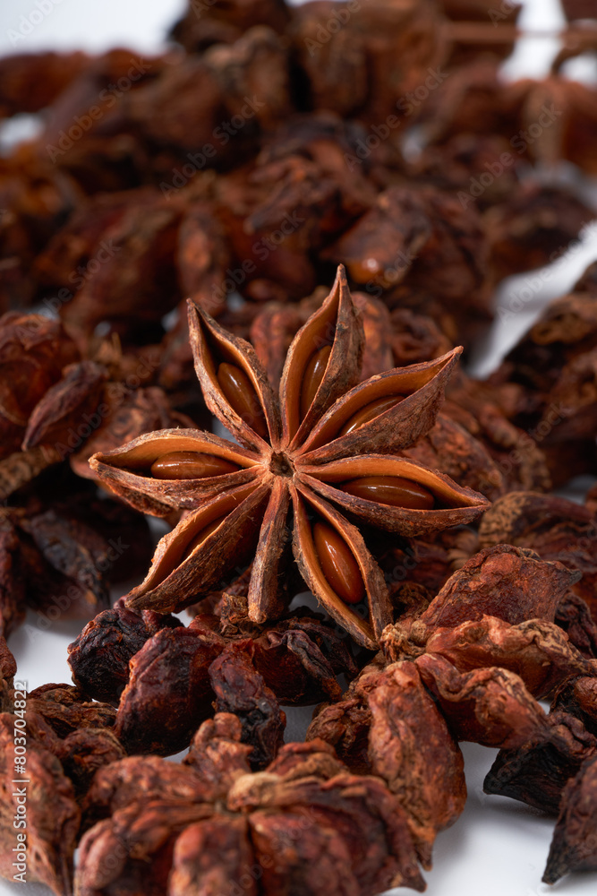 Fototapeta premium Star anise spice creative atmosphere on white background