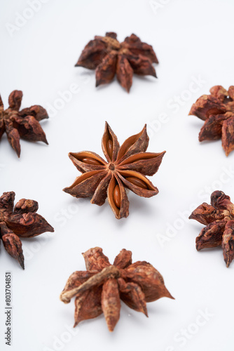 Star anise spice creative atmosphere on white background