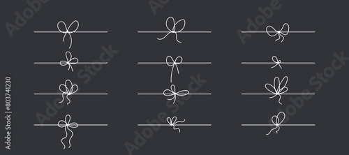 Line bows on ribbon for gift decoration. String with rope knots in doodle style, simple thin line wedding elements isolated on black background photo