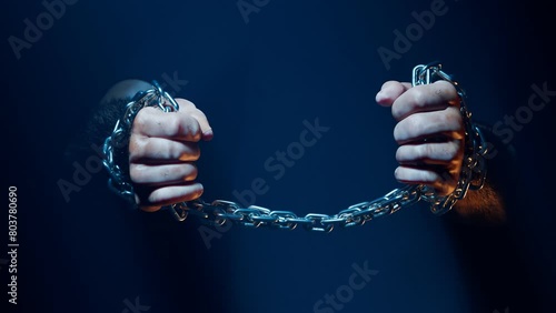 Hands Breaking Chains Metal Or Steel Chain Is Blown To Pieces Break Free Animation Of Hands Breaking Silver Chains Metal Or Steel Chain Is Blown To Pieces Concept Of Regains Freedom photo