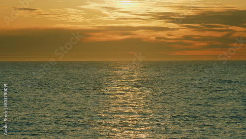 Shimmering Small Sea Waves In Sun. Surface Water Of Sea Or Ocean At Day Time With Light Tone. Real time.