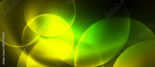 A macro photograph capturing the symmetry and intricate pattern of a blurred green and yellow circle on a black background, resembling a terrestrial plant artwork with varying tints and shades